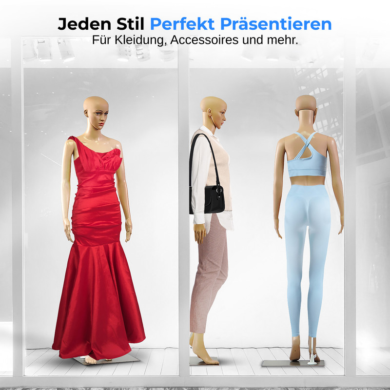 Drei Schaufensterpuppen präsentieren Kleidung: Ein rotes Kleid, ein Outfit mit Weste und Hose, und Sportbekleidung.