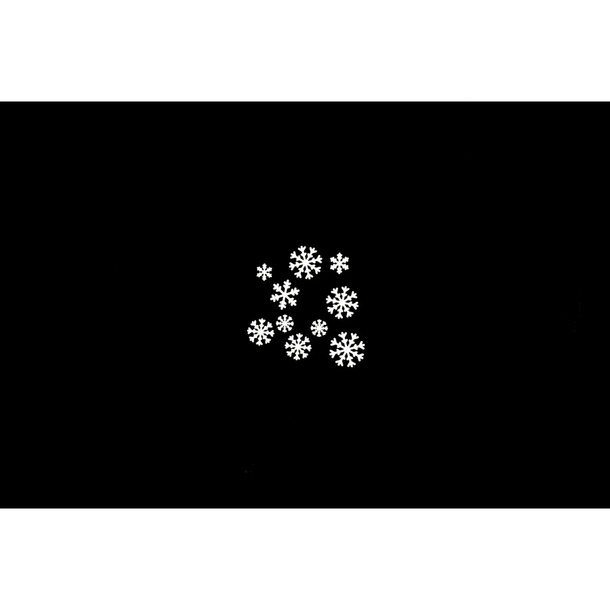 Eine Gruppe von weißen Schneeflocken auf schwarzem Hintergrund.