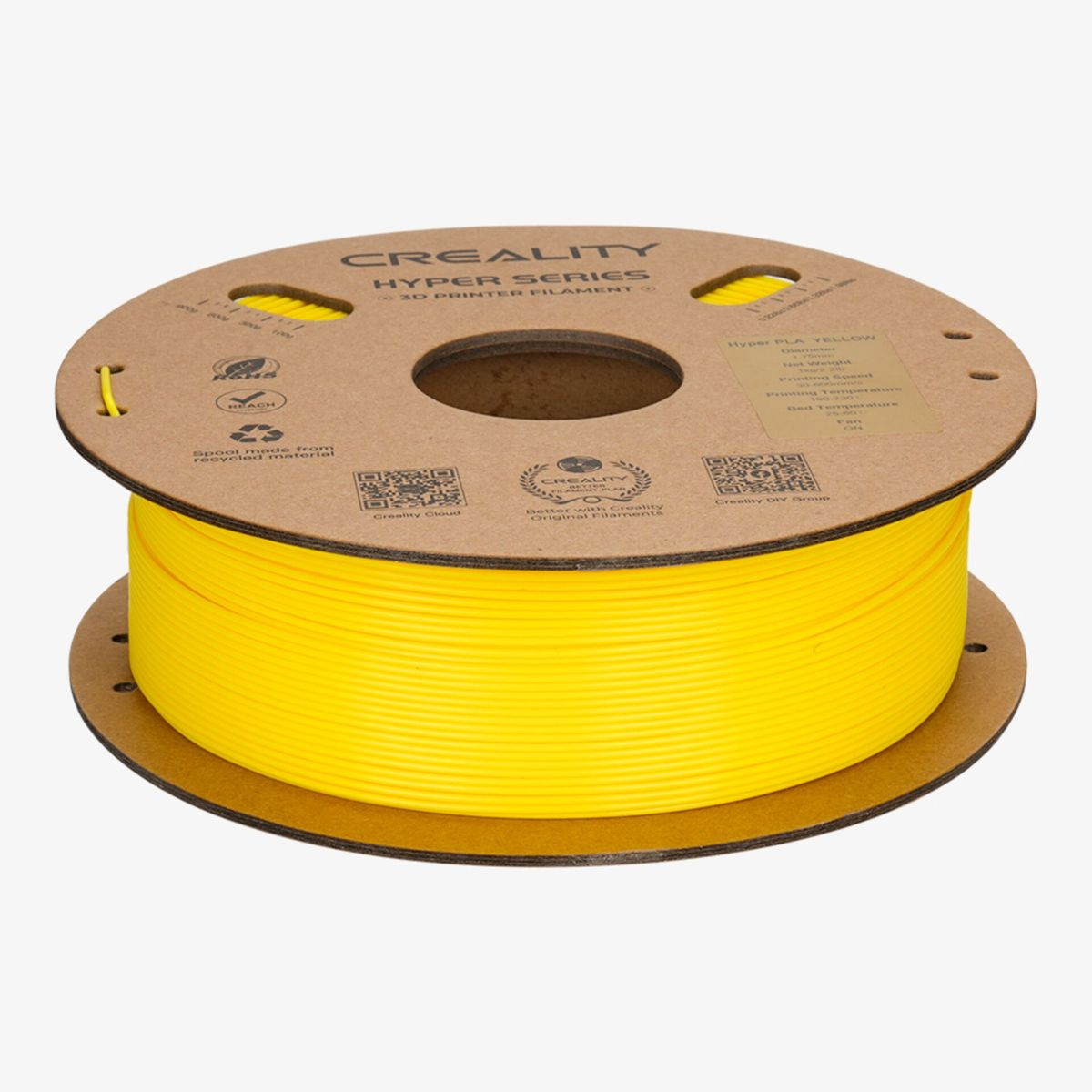 Una bobina di filamento giallo Creality Hyper Series per stampante 3D su sfondo bianco.