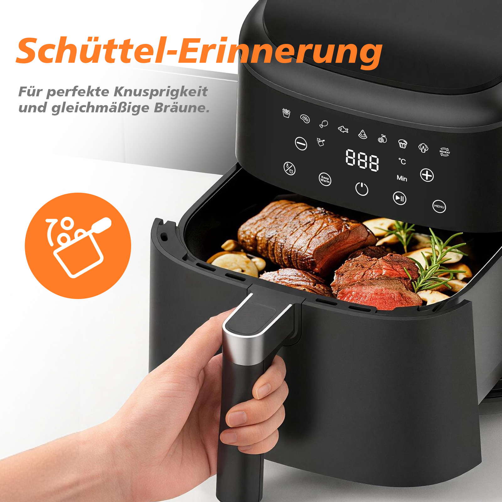 Ein schwarzer Heißluftfritteusekorb mit Fleisch und Rosmarin wird herausgezogen.
