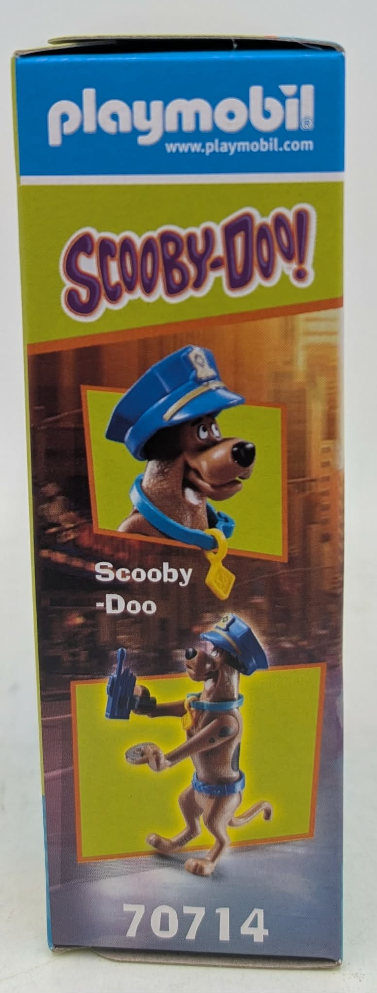 Scatola Playmobil Scooby-Doo con figure, blu e verde.