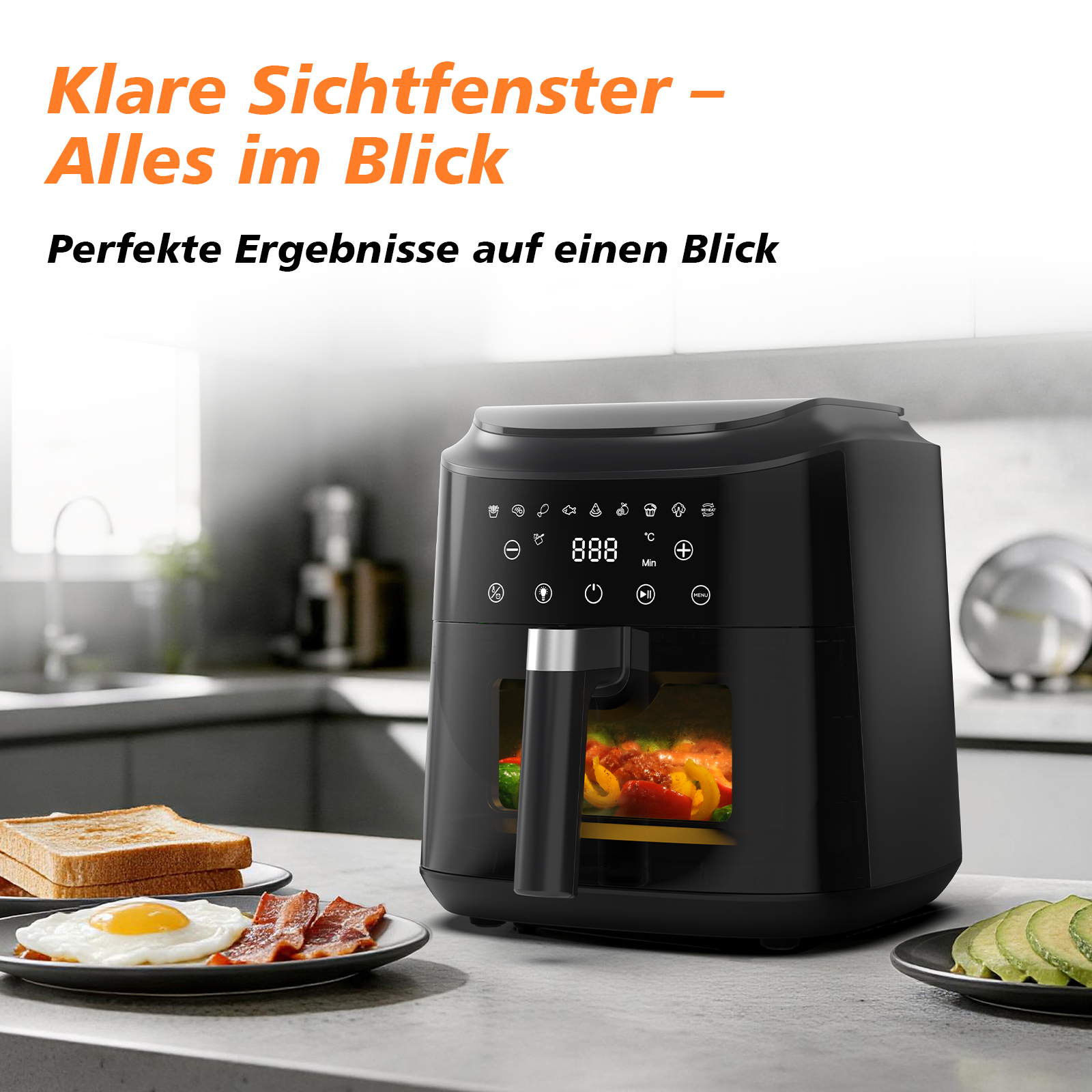 Schwarzer Airfryer mit Sichtfenster, daneben Frühstück und Avocado.