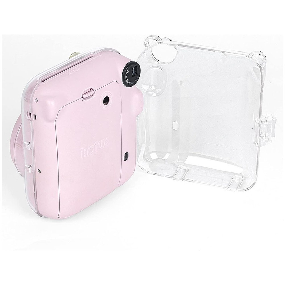 Pembe bir Instax kamera ve şeffaf koruyucu kılıf.