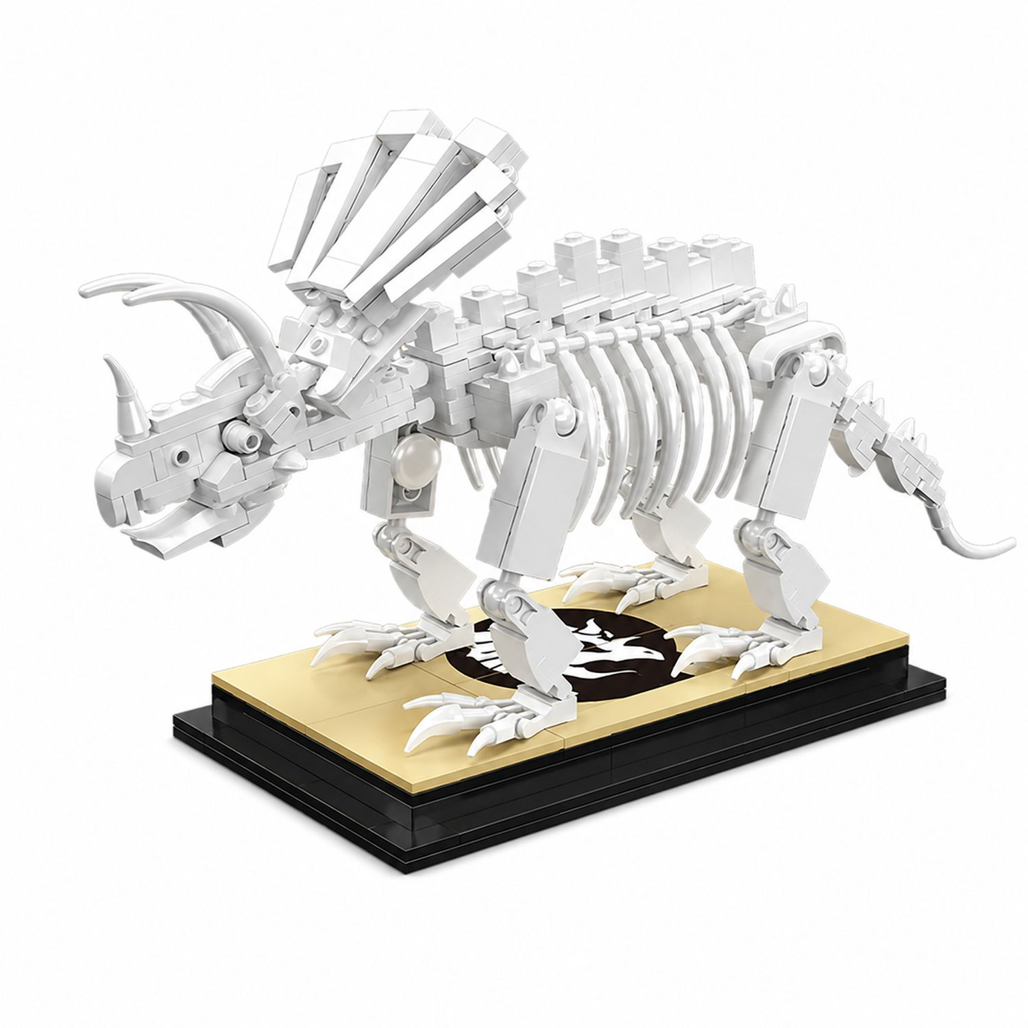 Un squelette de dinosaure blanc en briques de jouet, exposé sur un socle.