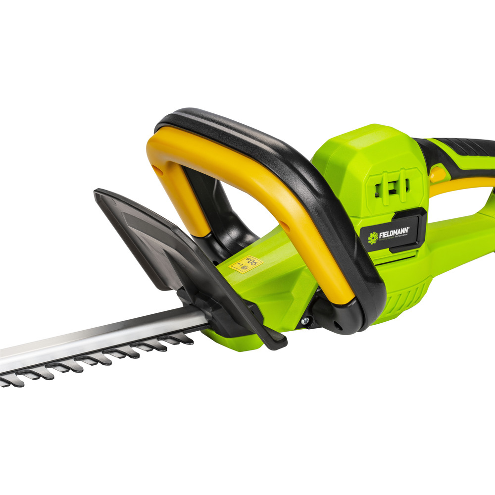 Tagliasiepi verde con manico giallo e scocca nera.