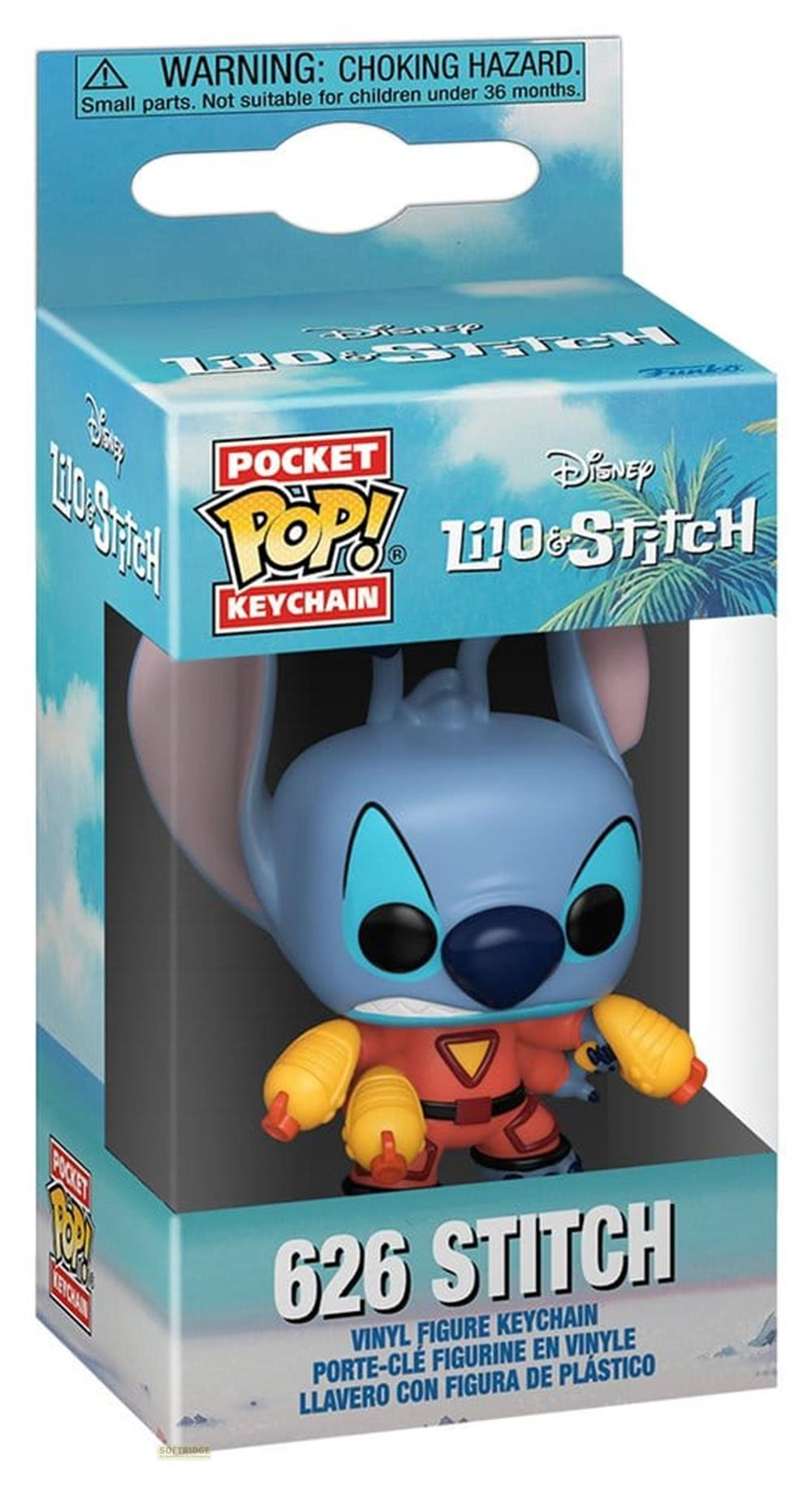 Una figura llavero de Stitch en una caja con etiqueta de advertencia.