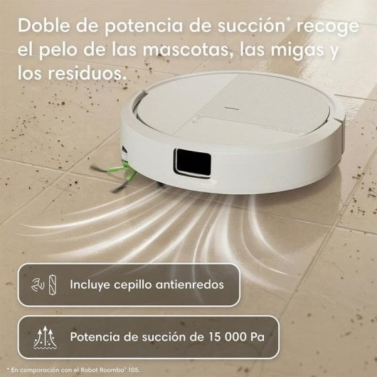 Un robot aspirapolvere bianco pulisce lo sporco da un pavimento piastrellato.