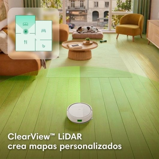 Un robot aspirapolvere bianco mappa un pavimento in legno verde chiaro in un soggiorno.