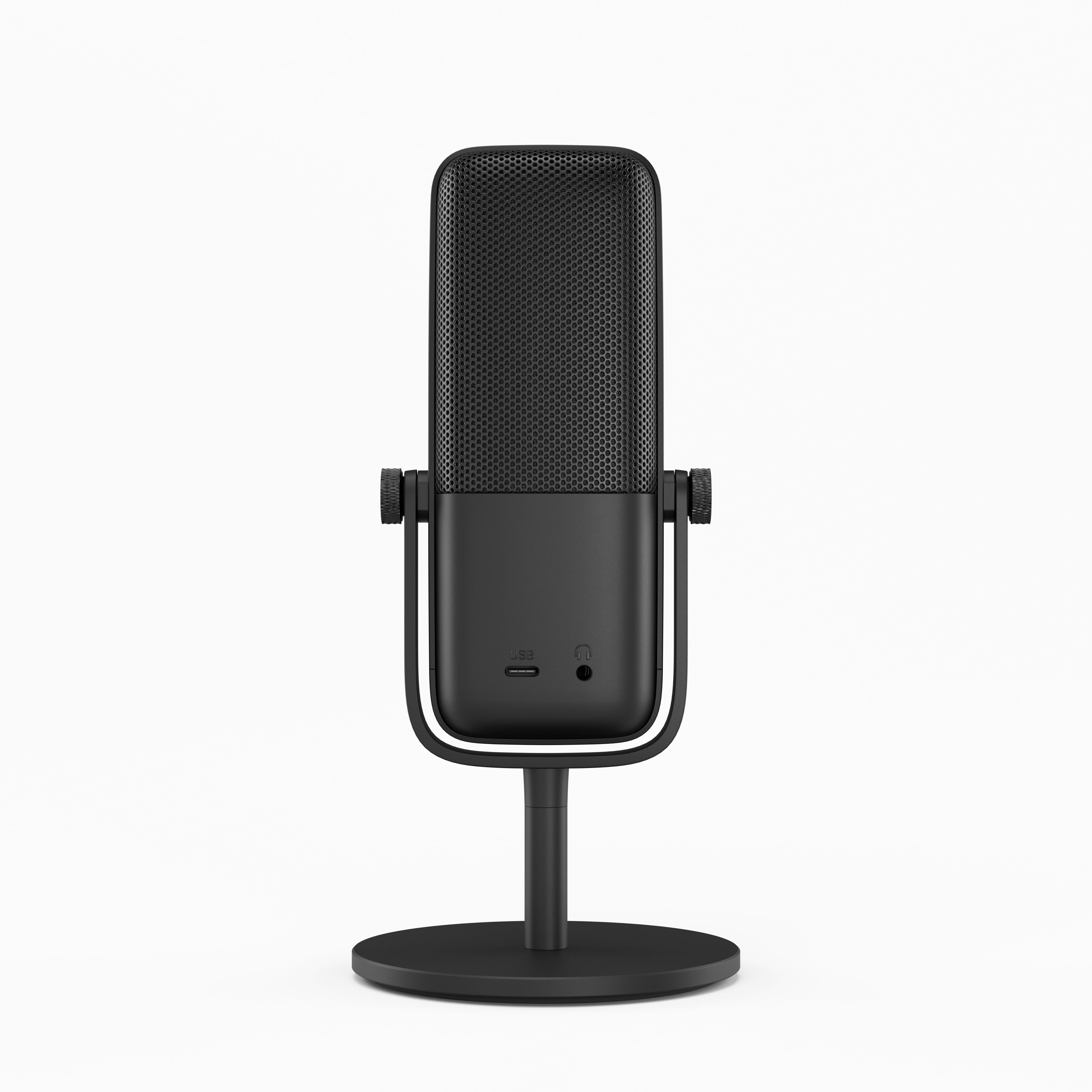 Czarny prostokątny mikrofon z siatkową górą i solidną podstawą, wyposażony w port USB-C i gniazdo słuchawkowe, stoi centralnie.