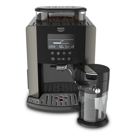 Una macchina per espresso Krups grigia e nera con tramoggia per chicchi e montalatte.
