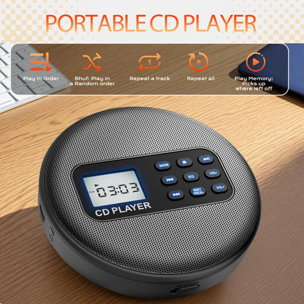 Tragbarer CD-Player mit digitalen Anzeige- und Wiedergabesteuerungen auf Holztisch.
