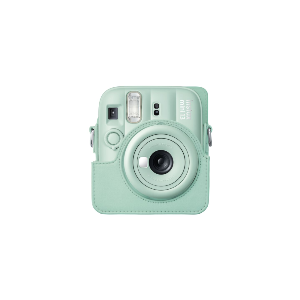 Una cámara instantánea verde menta con funda de cuero, sobre fondo blanco.
