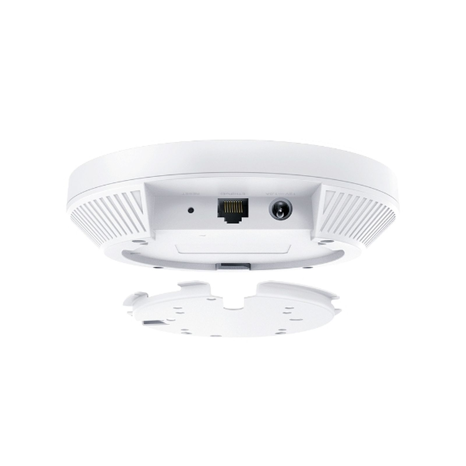 Parte inferiore di un dispositivo bianco con porte Ethernet e di alimentazione.