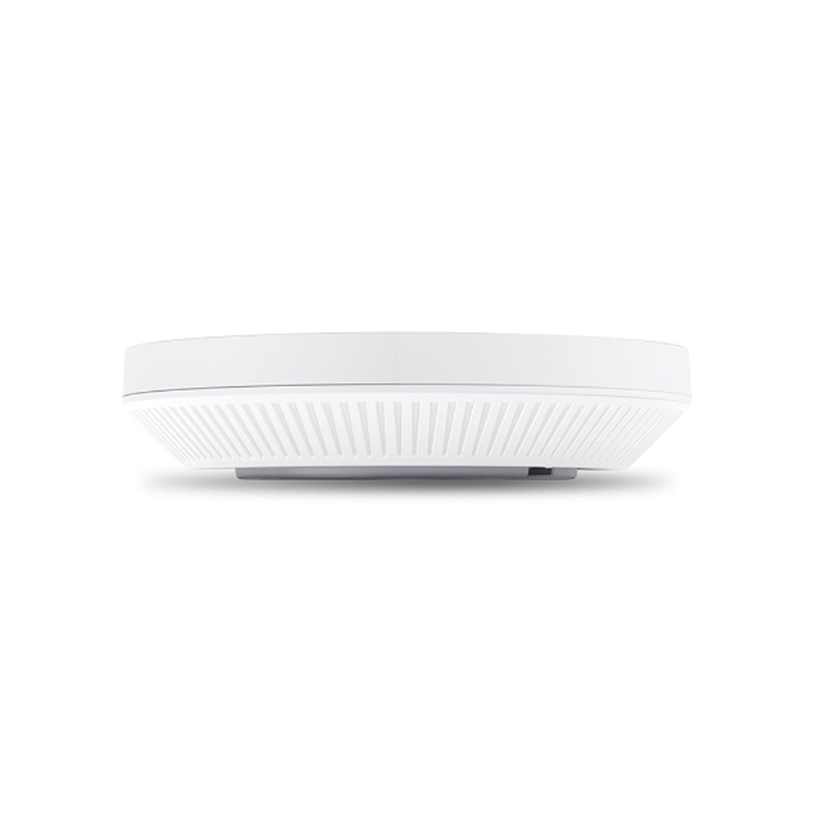 Un dispositivo bianco e rotondo con bordo scanalato, su sfondo bianco.