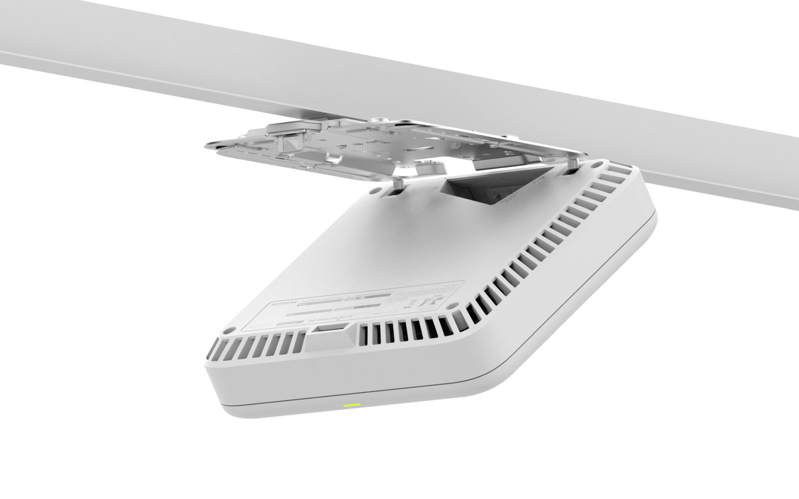 Un punto de acceso inalámbrico Netgear blanco está montado en un riel de techo blanco.