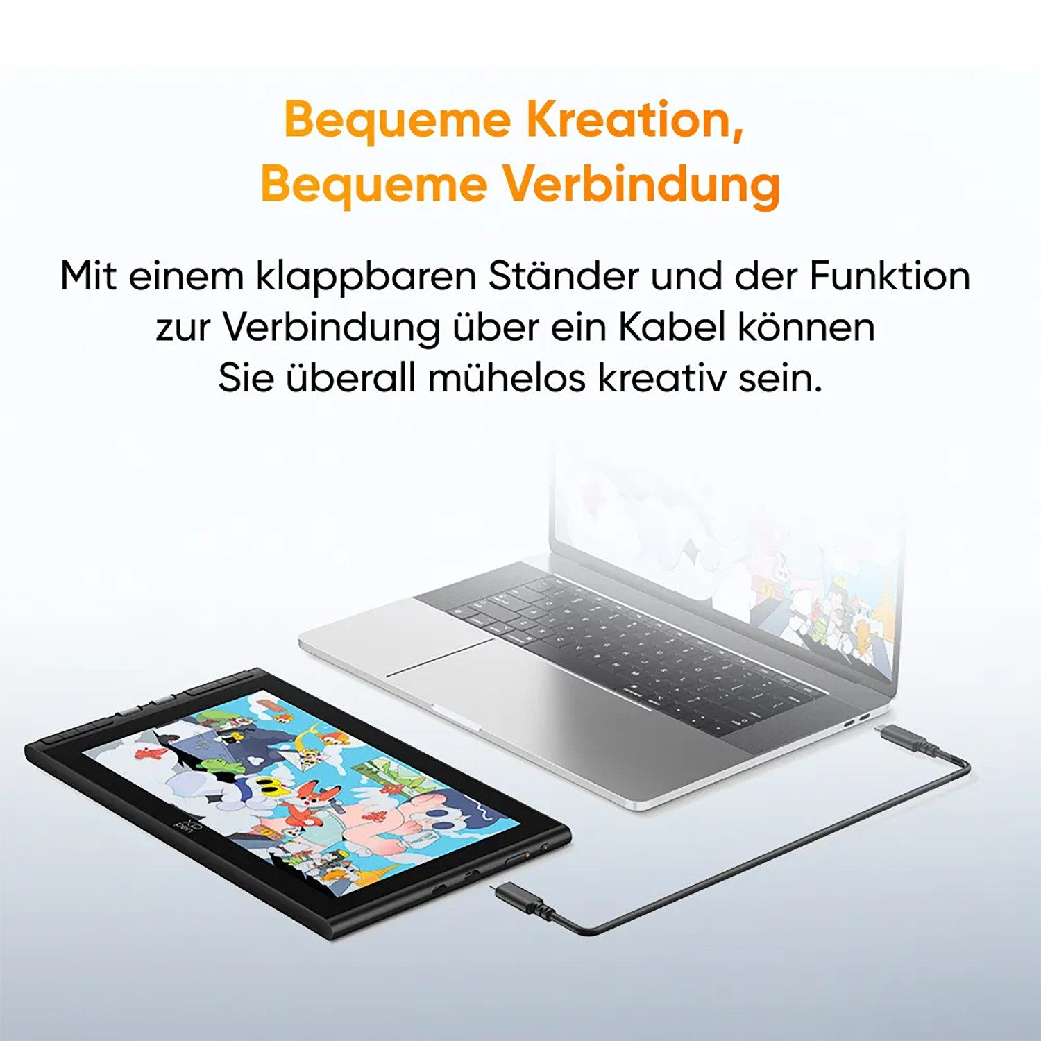 Ein Grafiktablett mit buntem Cartoon-Display ist mit einem Laptop verbunden.