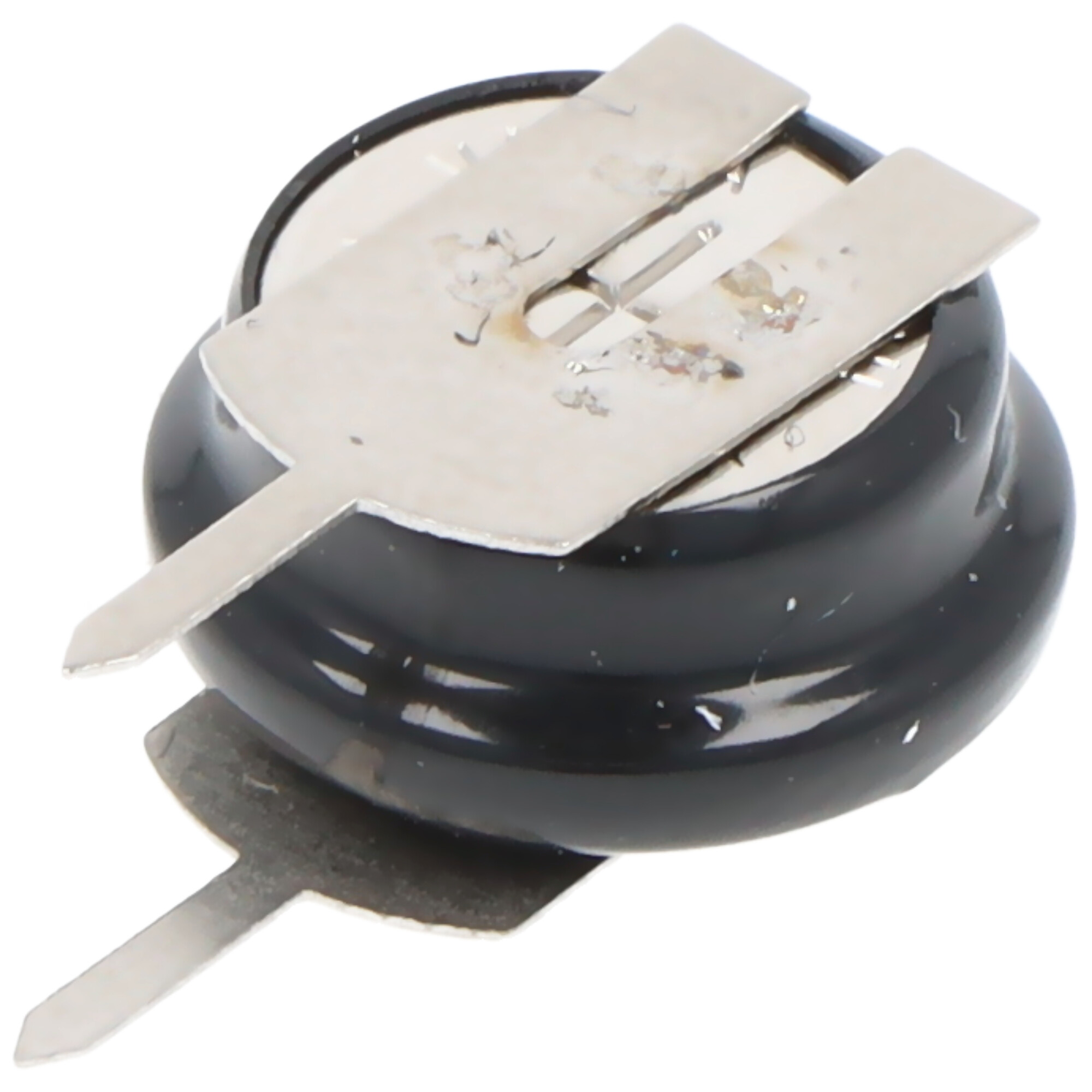 Eine kleine, schwarze, runde Batterie mit zwei silbernen Metalllaschen oben.