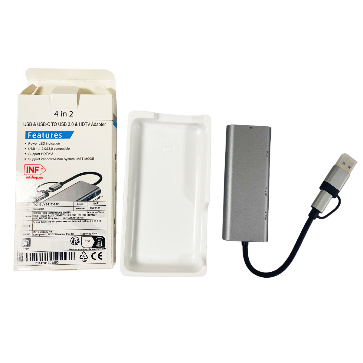 Ein silberner USB-C-Adapter mit HDMI- und USB-3.0-Anschlüssen neben einer Verpackung.