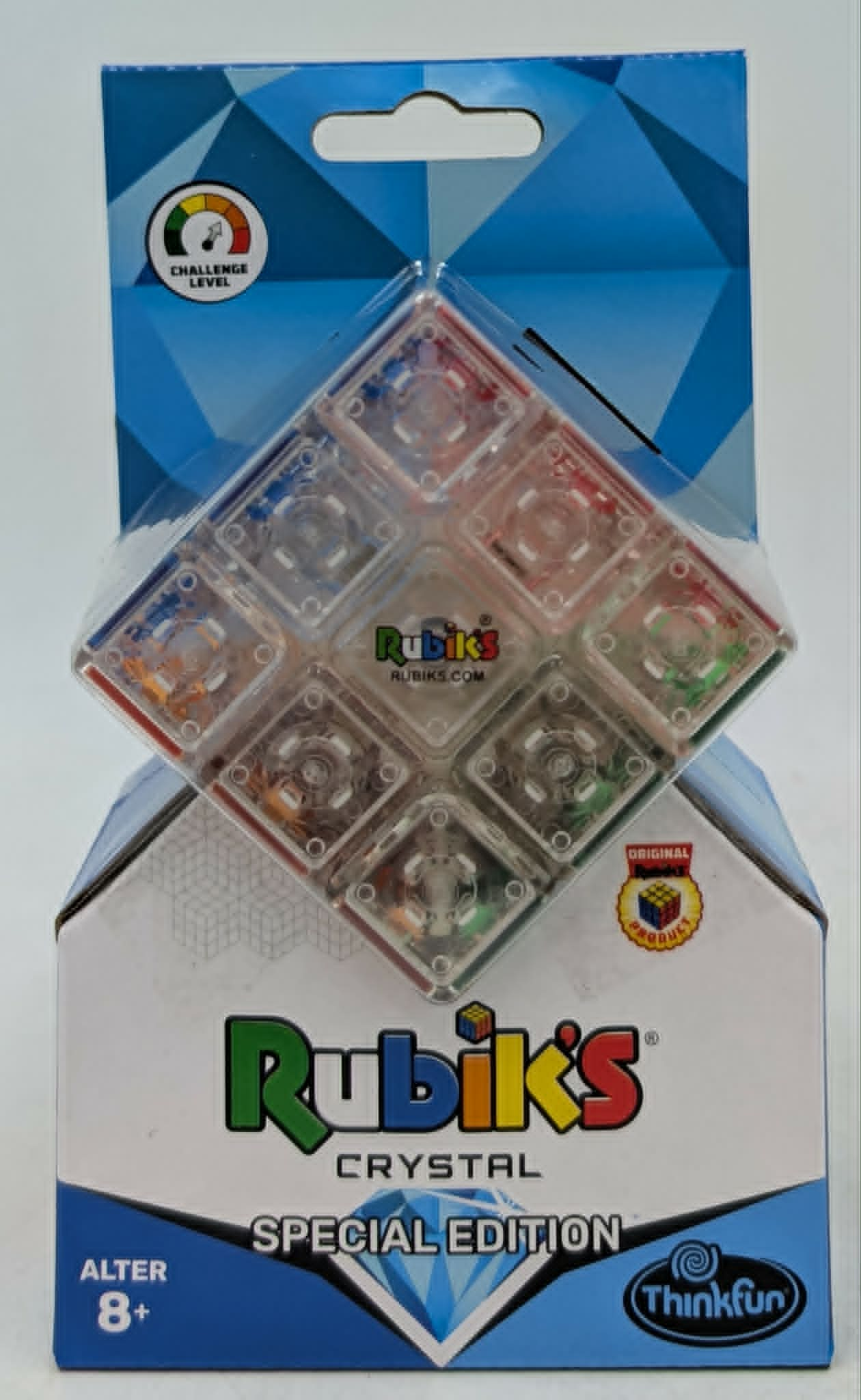 Rubiks Kristall Spezial-Edition Würfel in transparenter Verpackung mit blauer und weißer Kartonage.