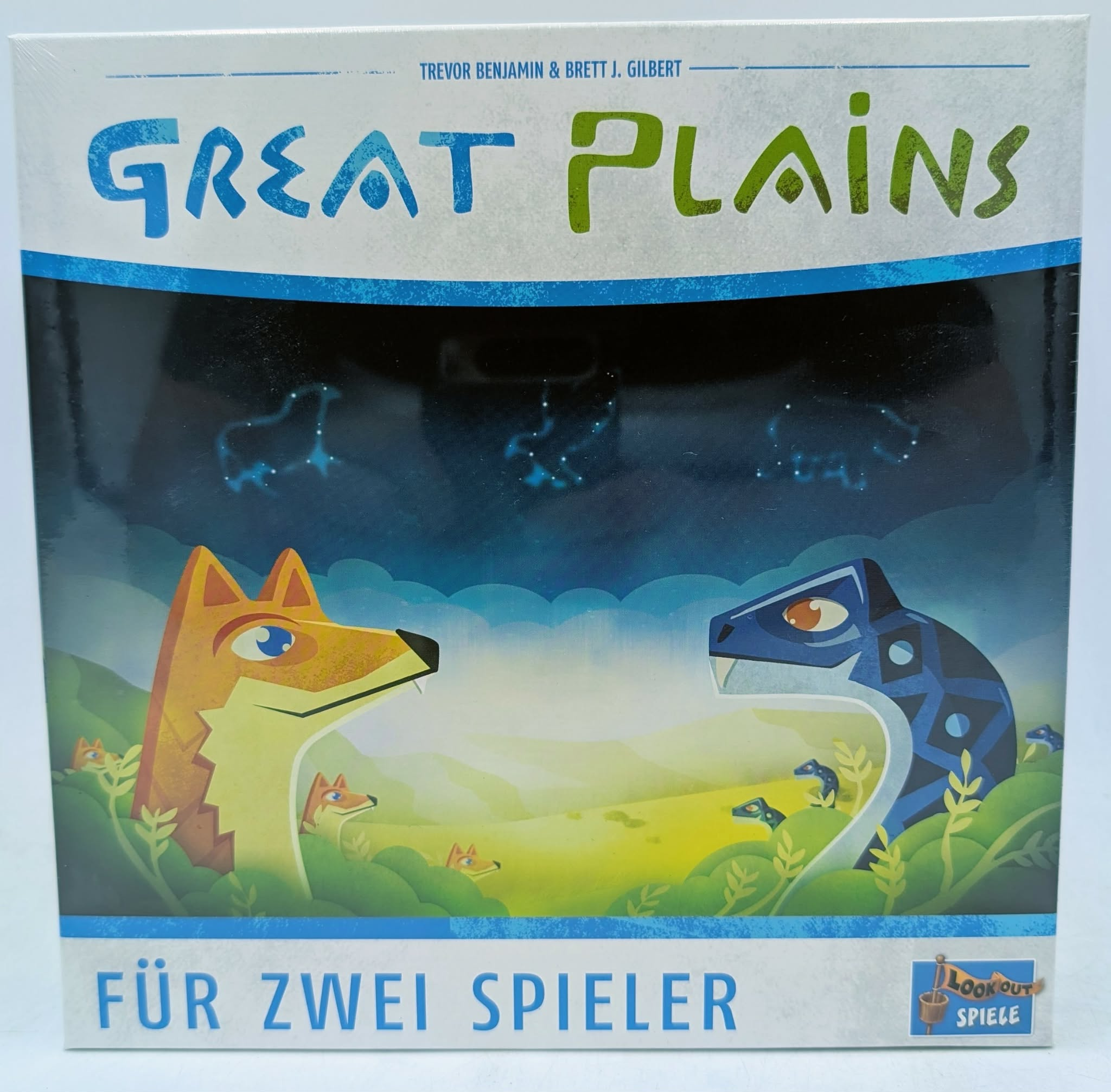 Brettspiel "Great Plains" für zwei Spieler mit Fuchstier und Dinosaurier-Illustration.