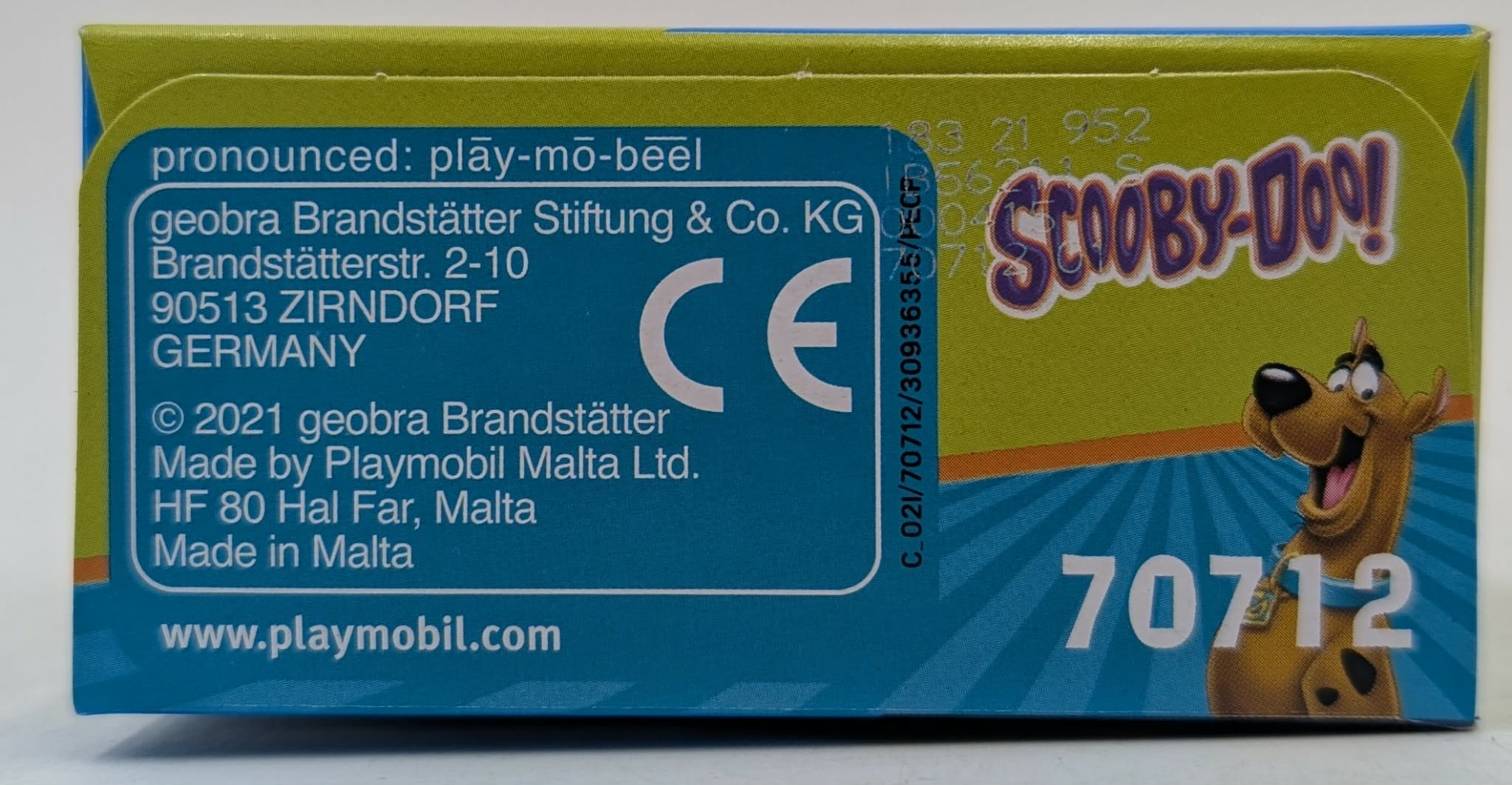 Pudełko Playmobil z logo Scooby-Doo, znakiem CE i informacjami o produkcie.