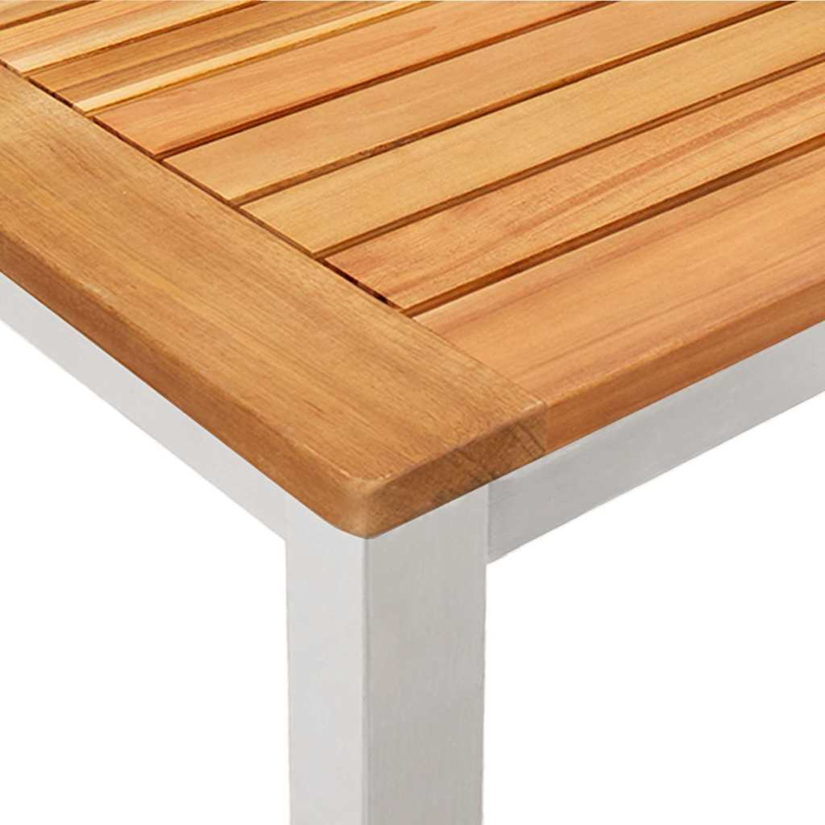 Primer plano de la superficie de una mesa de madera con patas blancas.