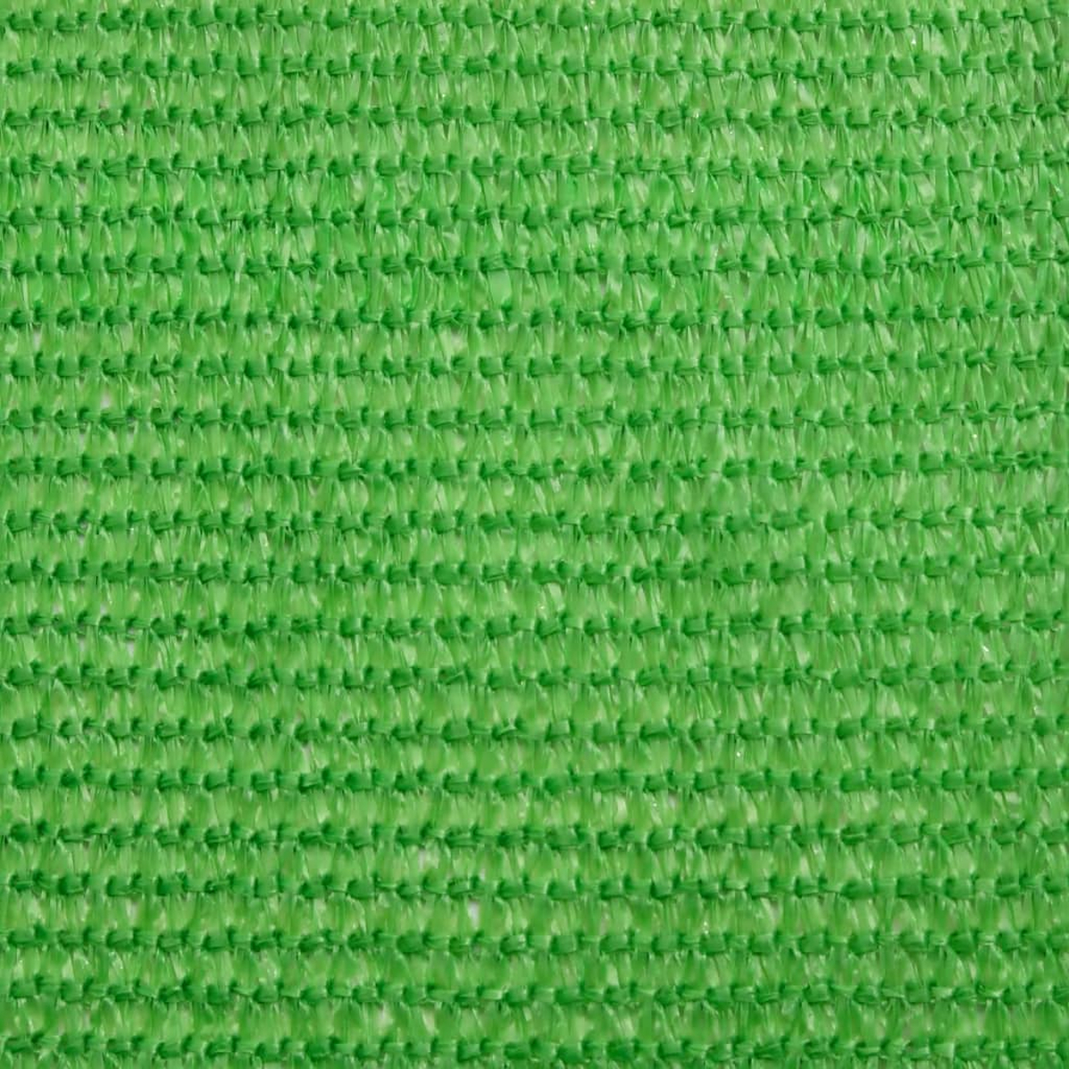 Una vista ravvicinata di un tessuto a rete verde brillante con trama tessuta.