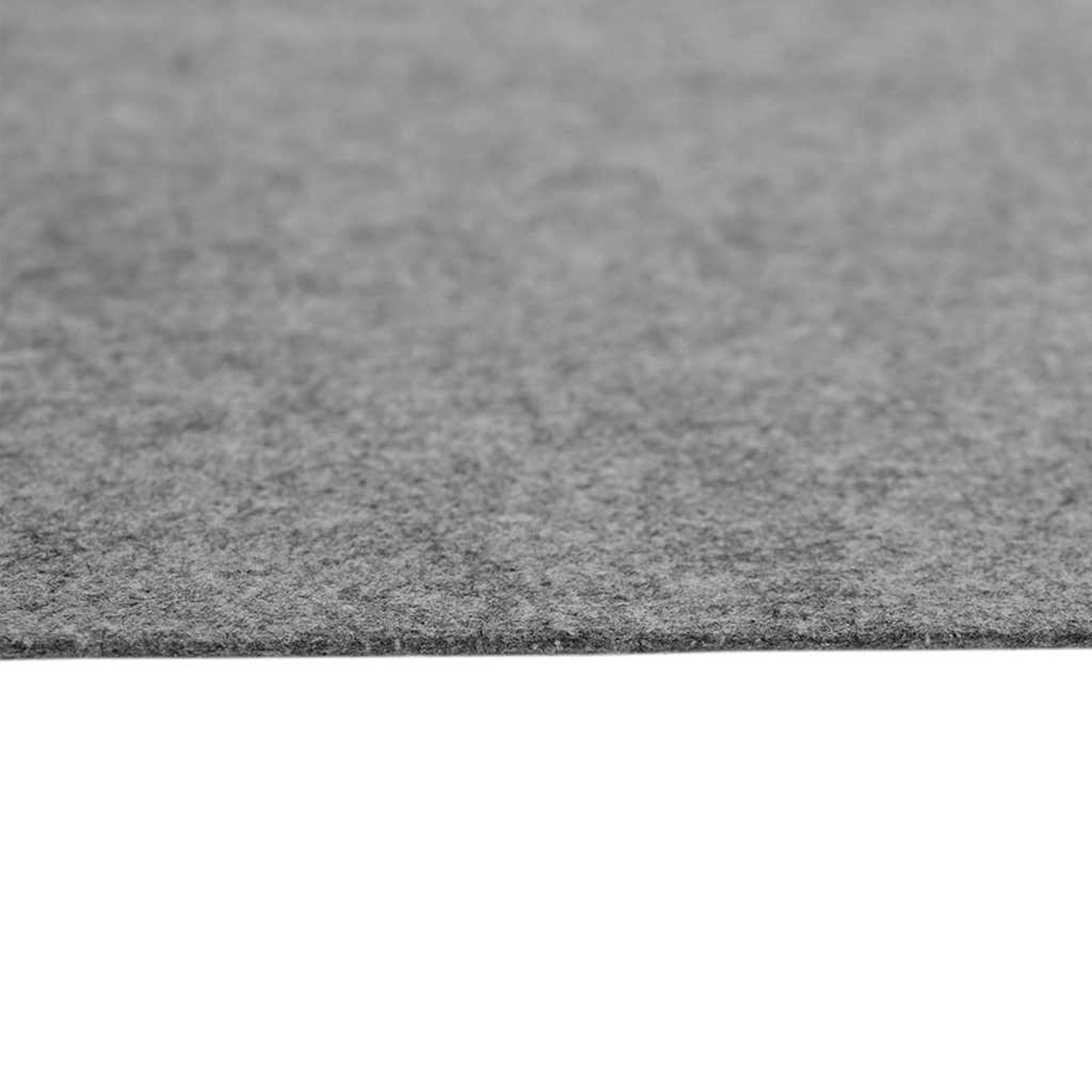 Eine Nahaufnahme eines grauen, texturierten Materials, das einen Teppich darstellen könnte.