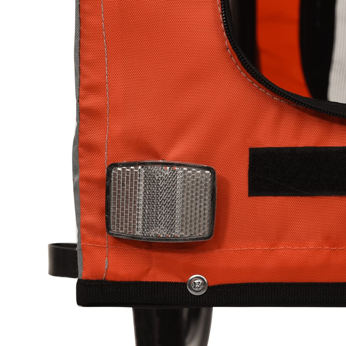 Orange Stofftasche mit Reflektor und schwarzem Klettverschluss.