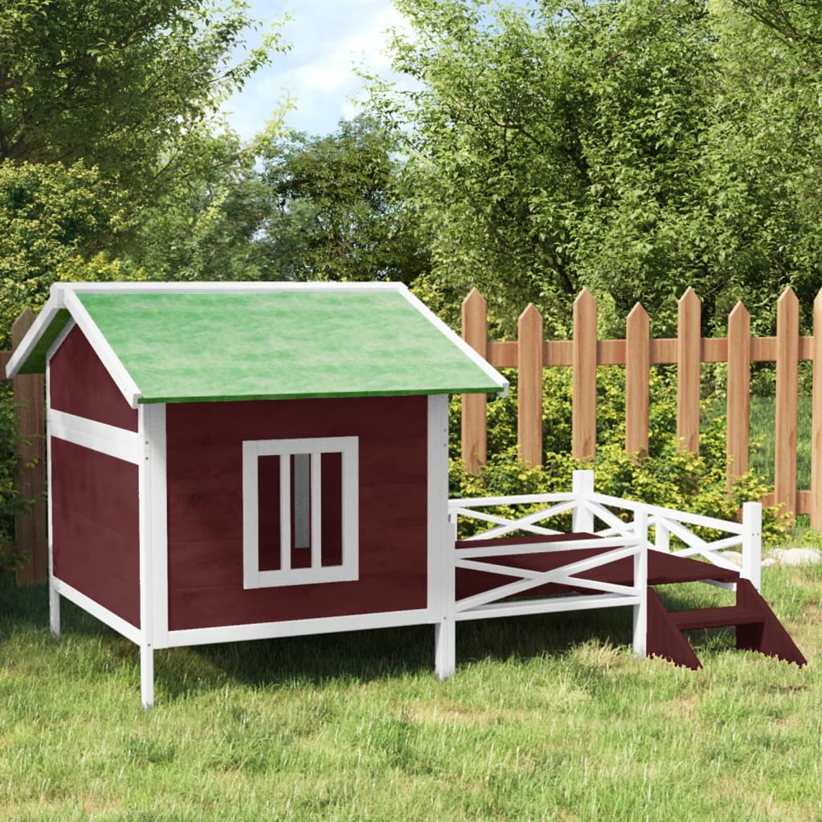 Ein rotes und weißes Holzhaus mit grünem Dach und Leiter steht auf Gras.