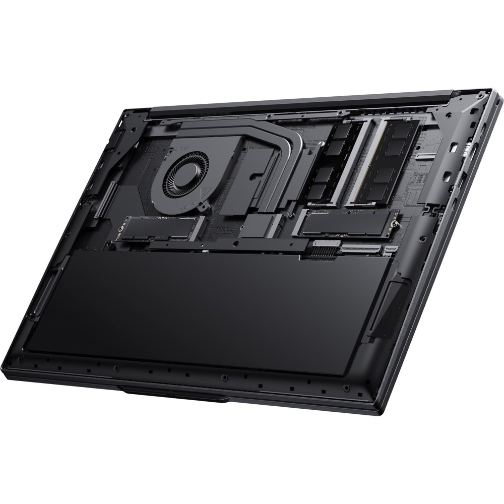 Wnętrze laptopa z wentylatorem, modułami RAM i radiatorami na płytkach drukowanych.