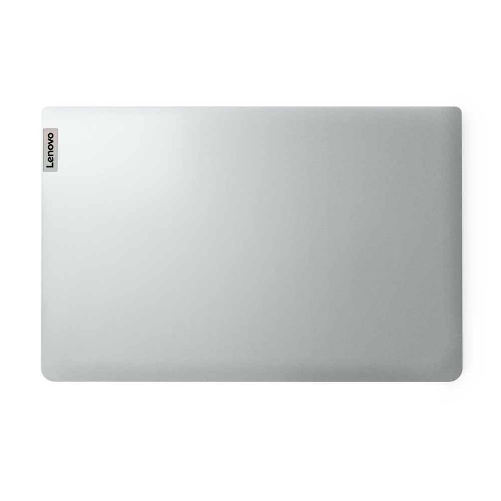 Zamknięty srebrny laptop z logo Lenovo w lewym górnym rogu.