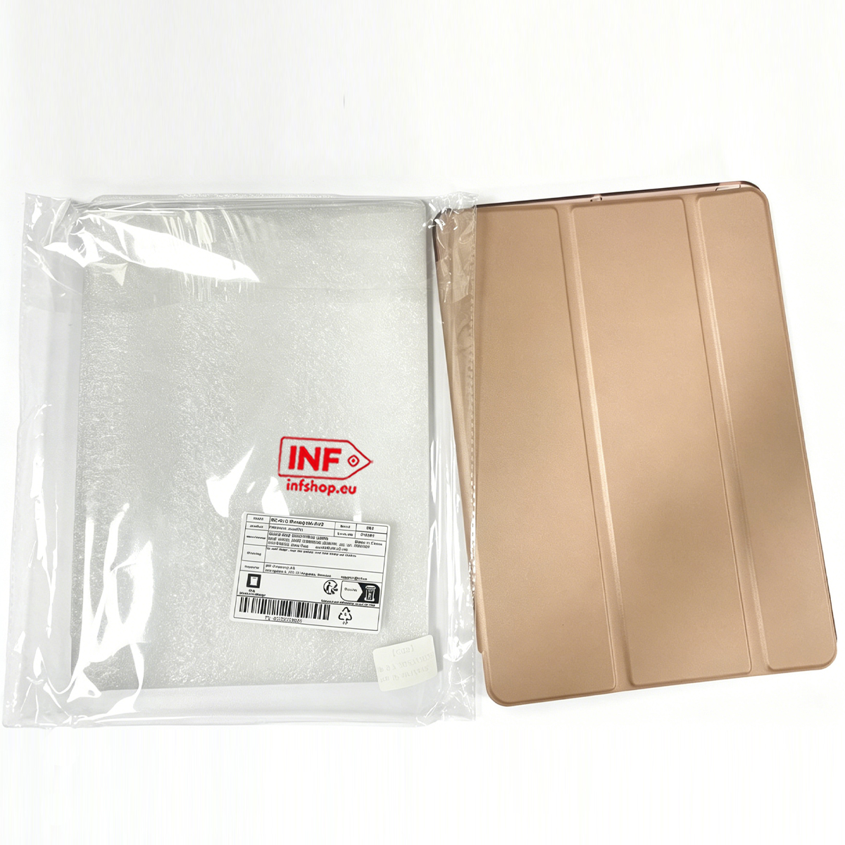 Ein goldener Tablet-Ständer liegt neben einer verpackten Schutzhülle.