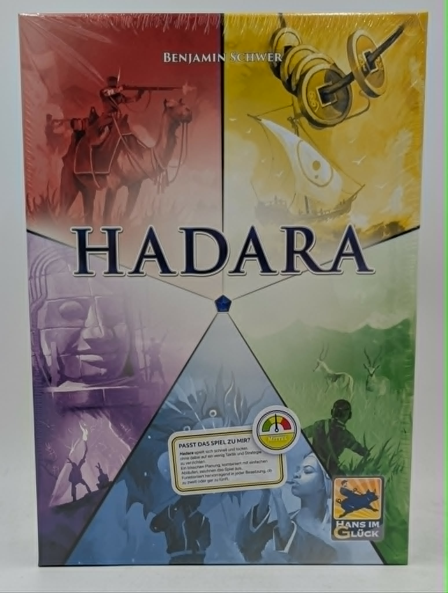 Brettspiel-Box 'Hadara' mit Bildern: Kamel, Schiff, Münzen, Buddha, Jäger.