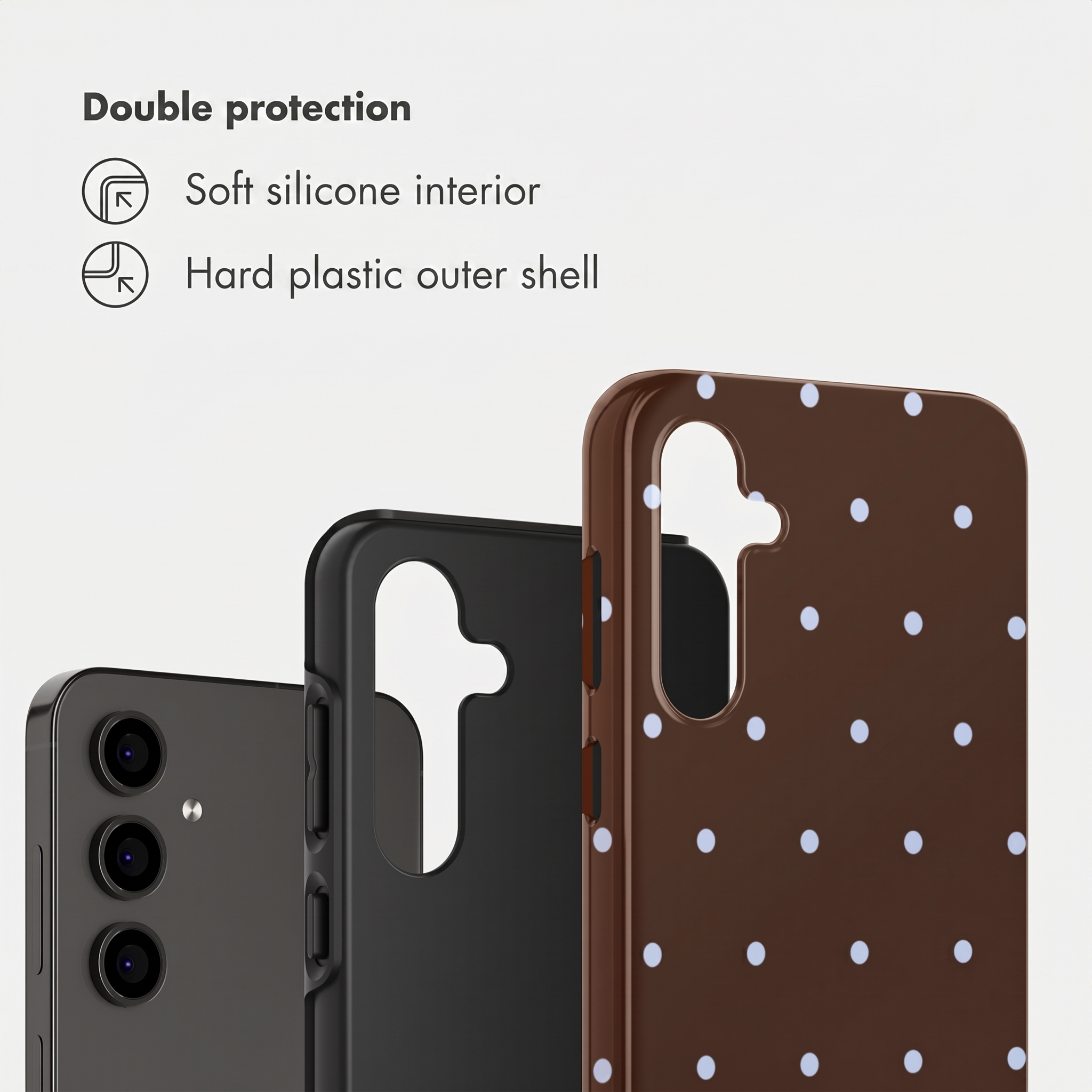 Ein dunkles Handy, eine schwarze Hülle und eine braune Hülle mit weißen Punkten.
