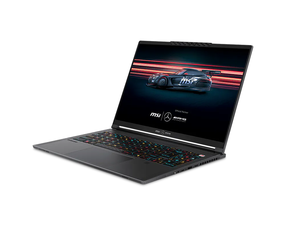 Un laptop MSI aperto mostra uno sfondo di auto da corsa sullo schermo con tastiera retroilluminata.