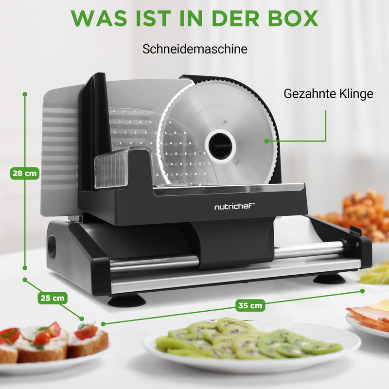 Eine schwarze Nutrichef Schneidemaschine mit gezahnter Klinge, daneben Brot und Kiwi.