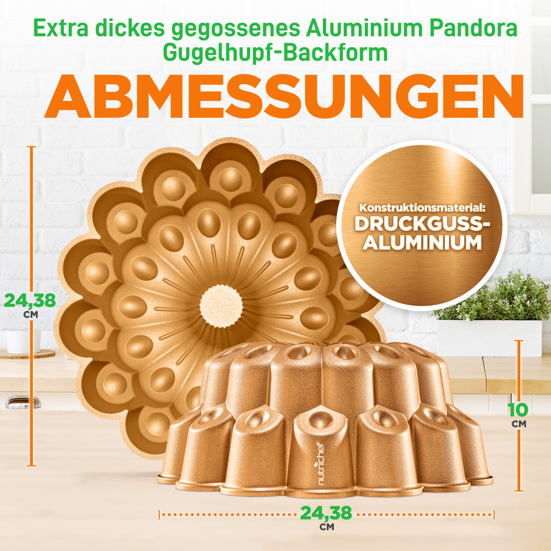 Goldene Gugelhupfform aus Aluminium mit detailliertem Muster. Maße 24,38x10 cm.