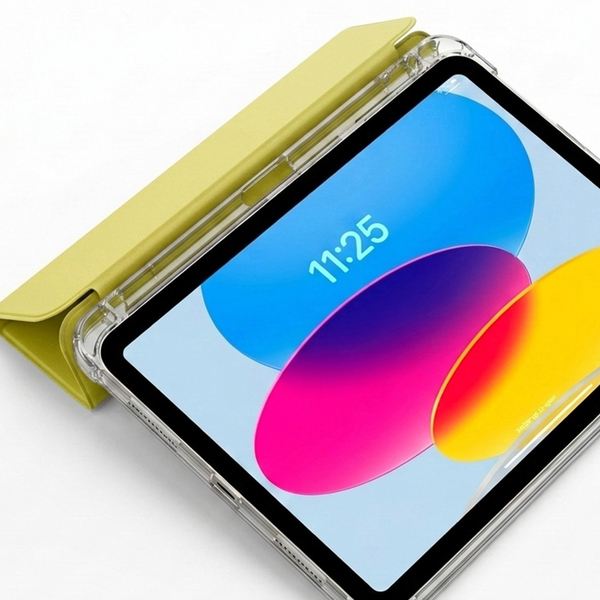 Żółte etui na tablet zakrywa połowę tabletu wyświetlającego kolorowe kółka i godzinę 11:25.