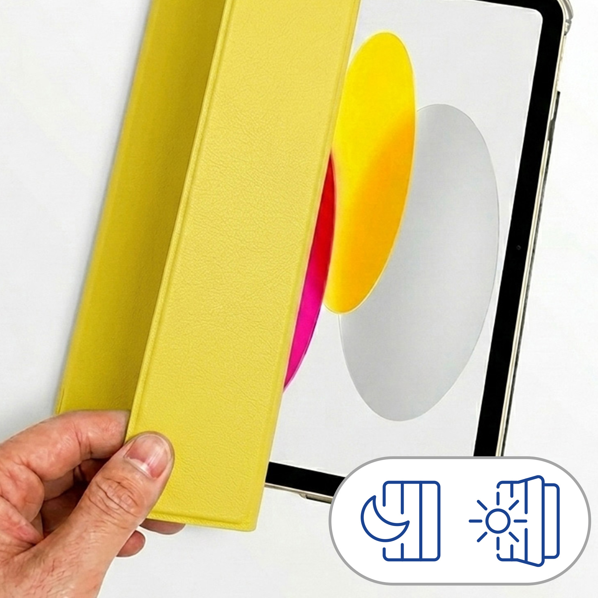 Żółta okładka jest kładziona na tablet z ikonami nocy i dnia.