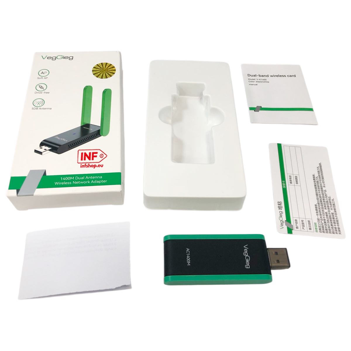 Ein VegGieg WLAN-Adapter mit zwei Antennen, Anleitung und Garantiekarte.