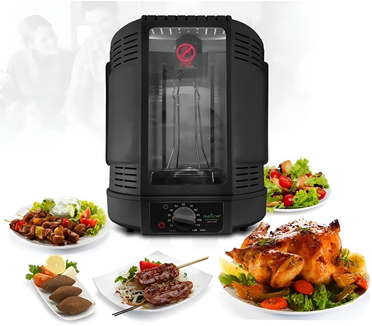 Ein schwarzer Rotisserie-Ofen mit Hähnchen, Kebab und Salat