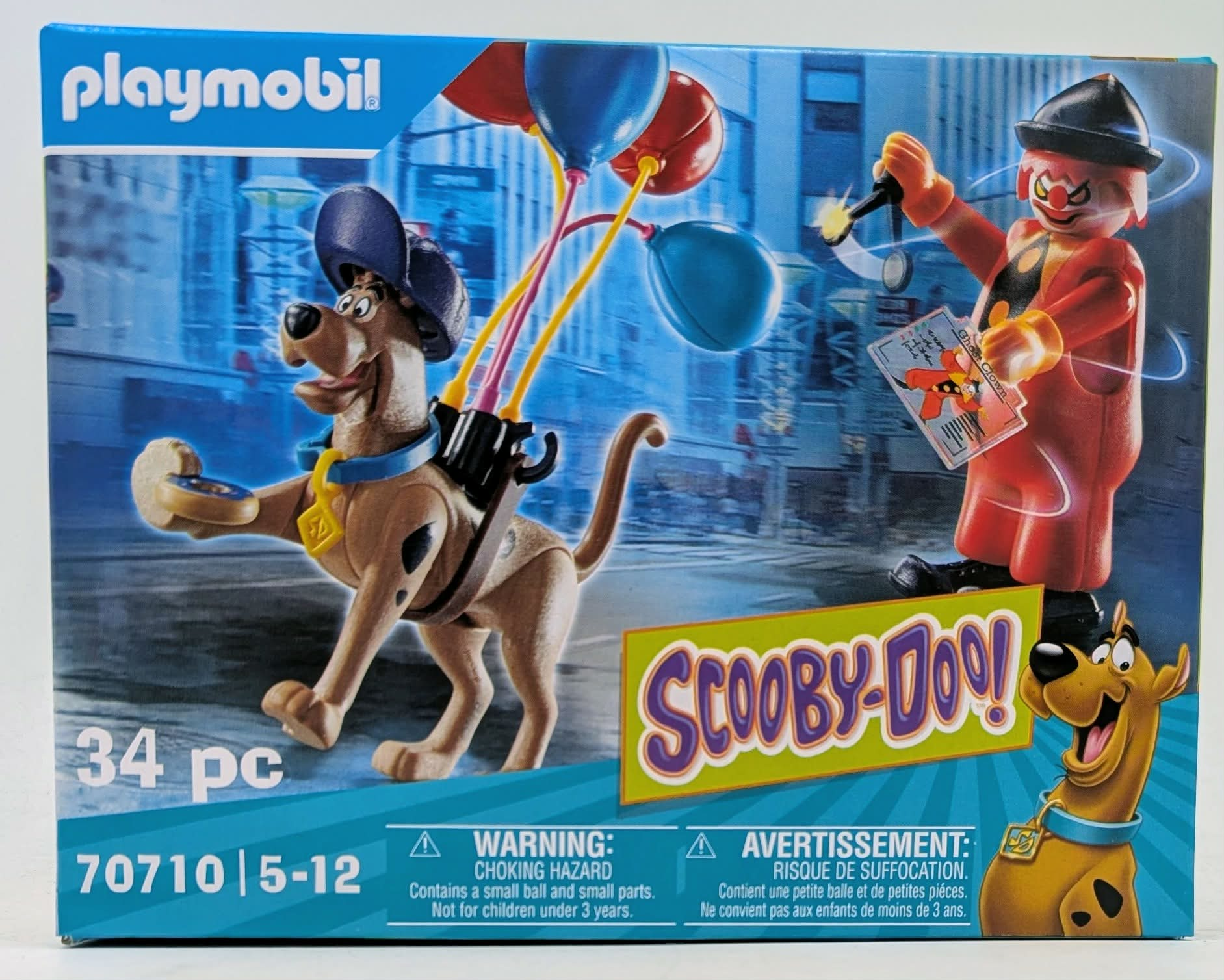 Zestaw Playmobil Scooby-Doo! ze Scoobym i klaunem złoczyńcą.