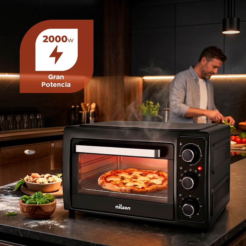 Un hombre cocina en una cocina, una pizza se hornea en un horno.