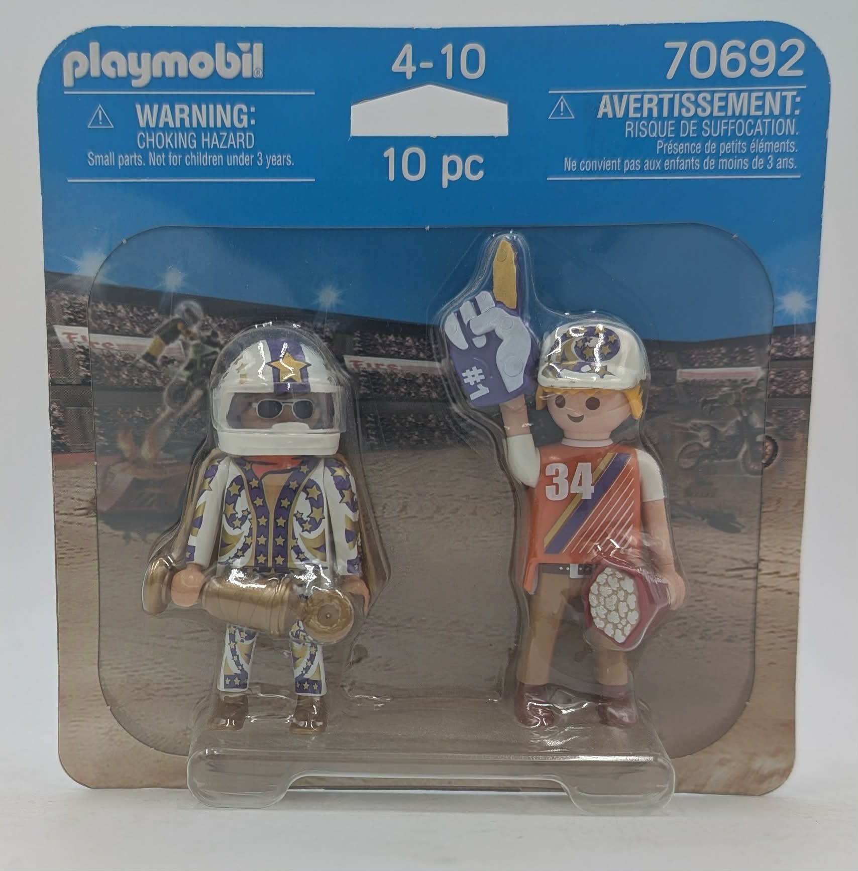 Personaggi Playmobil in confezione: un motociclista in tuta a stelle e un tifoso con dito di schiuma.