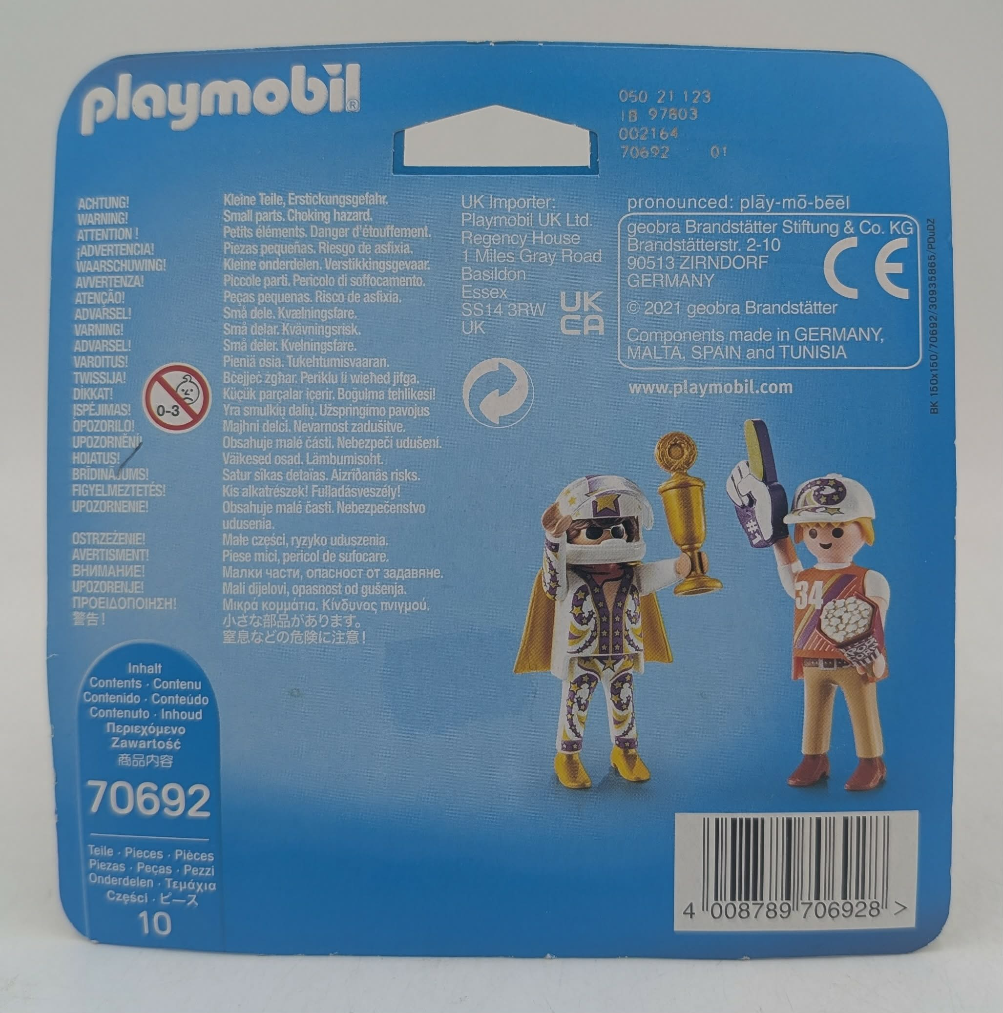 Confezione Playmobil con due figure, trofeo, popcorn e avvertenze.