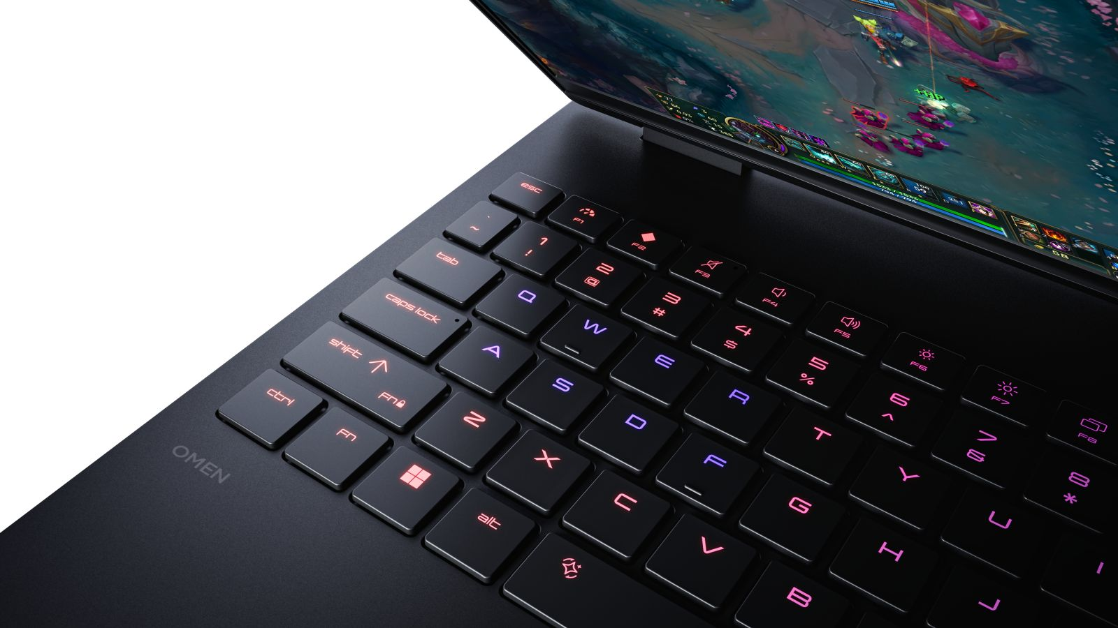 Ordinateur portable noir avec touches éclairées, affichant un jeu vidéo à l'écran.
