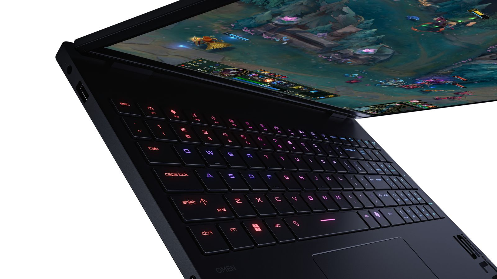 Ordinateur portable noir ouvert, affichant un jeu à l'écran et un clavier rétroéclairé.