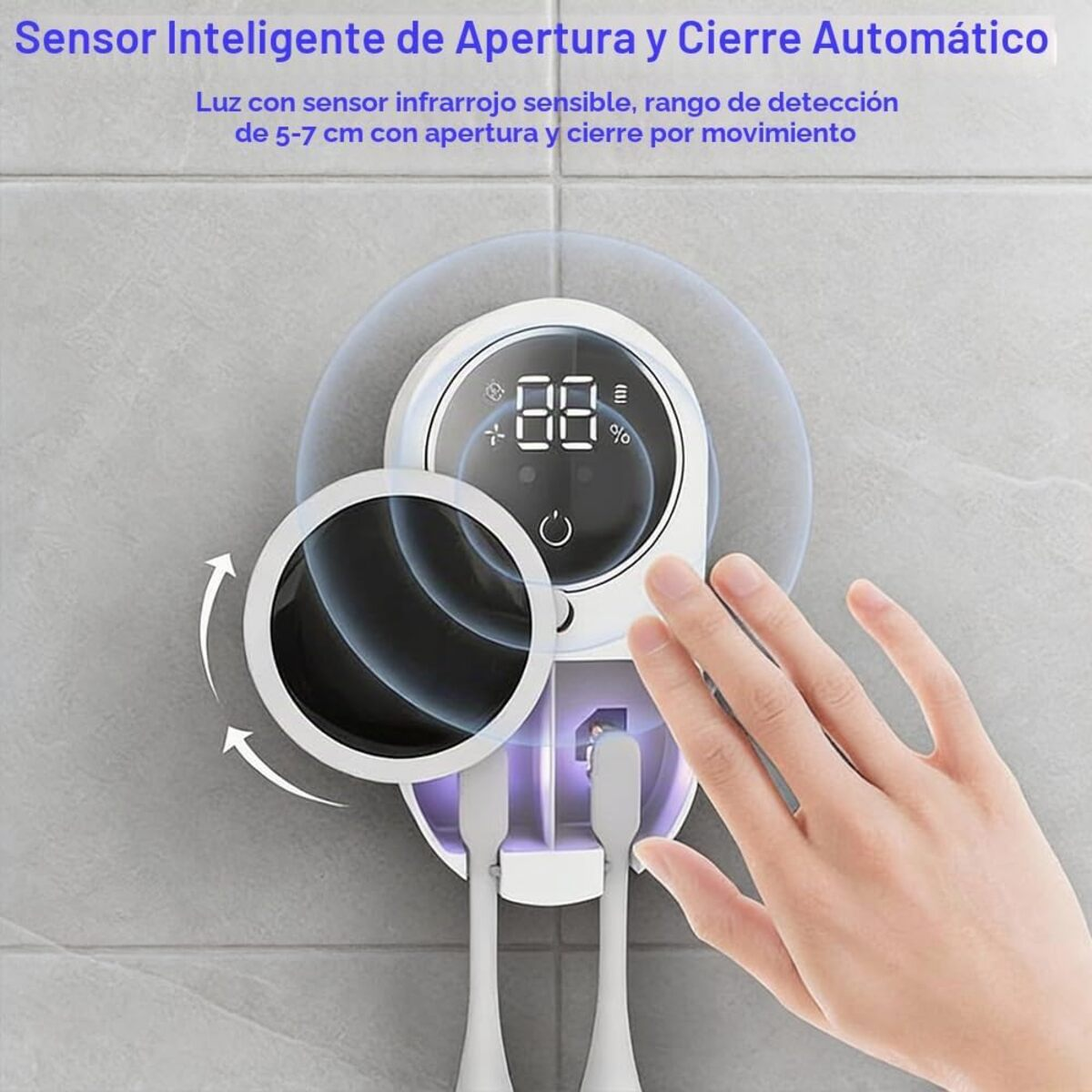 Un dispensador blanco automático con dos cepillos de dientes y una mano.