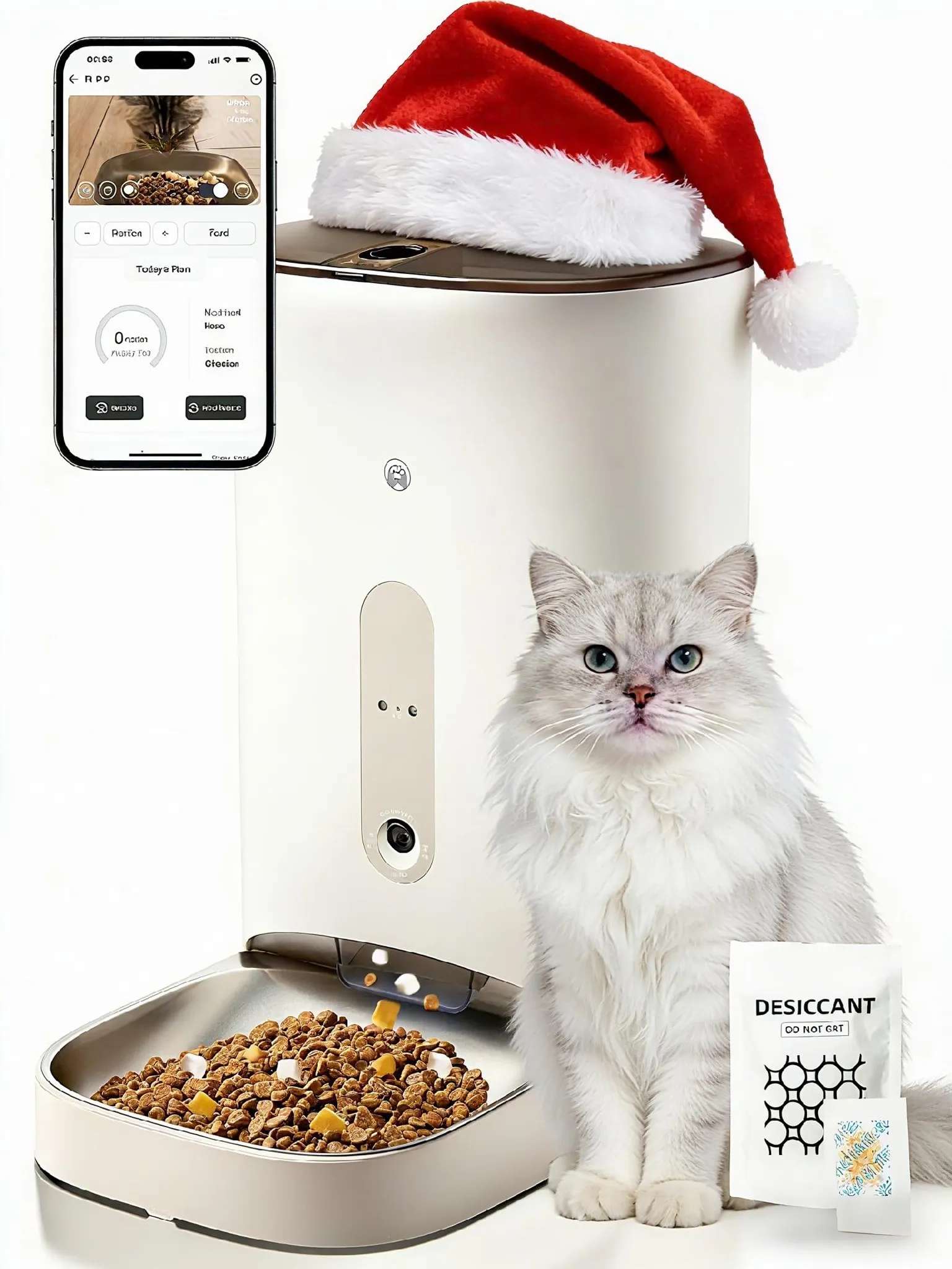 Ein weißer Katzenautomat mit Weihnachtsmütze, daneben eine Katze und Futter.